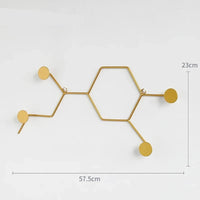 Porte-manteau mural doré minimaliste